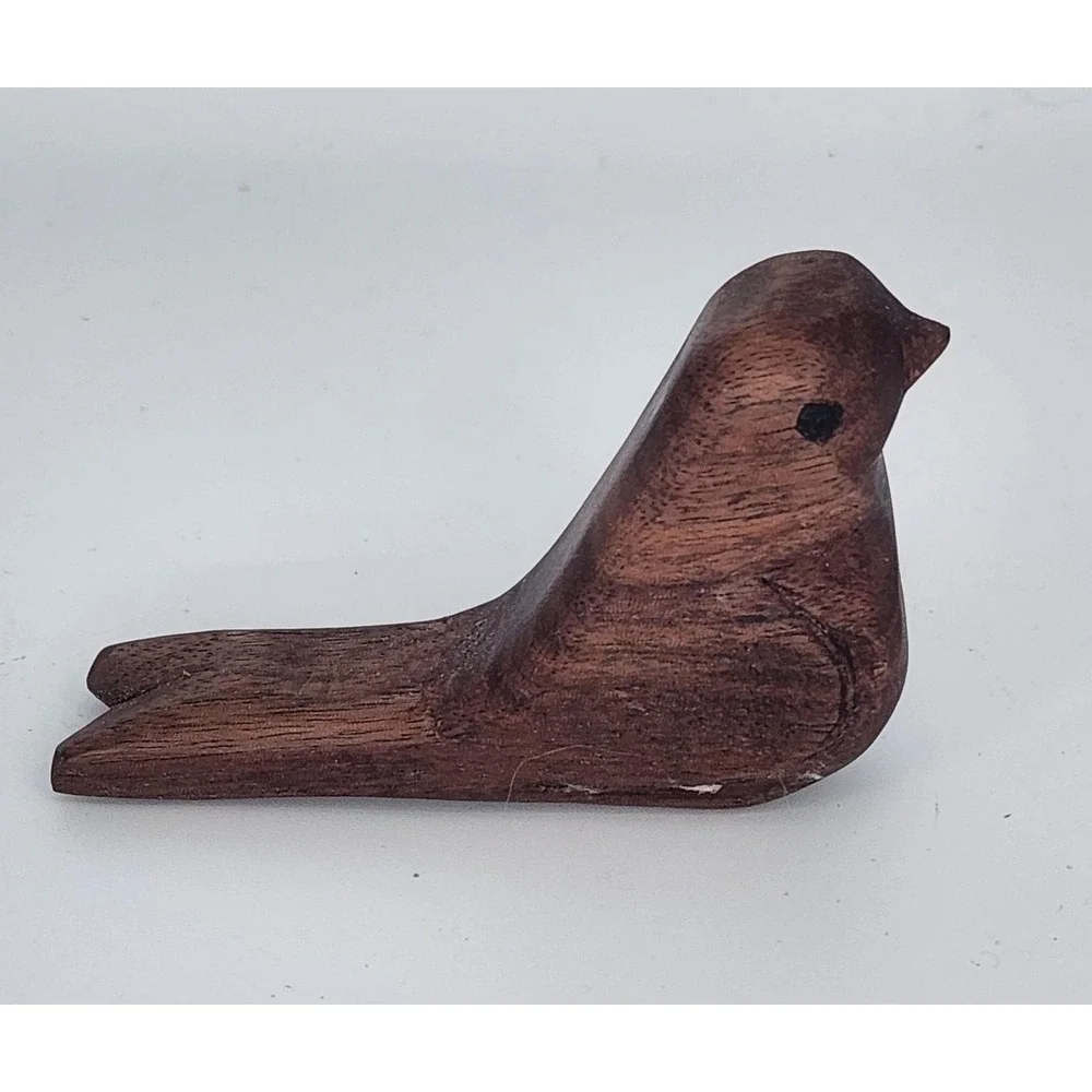 Hand carved‎ walnut comfort bird